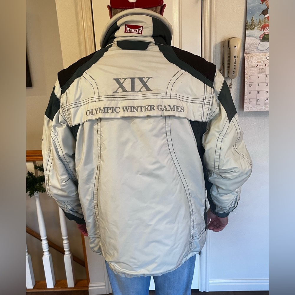 Vintage 2002 Winter Olympics men’s collectible coat for cold temperatures.